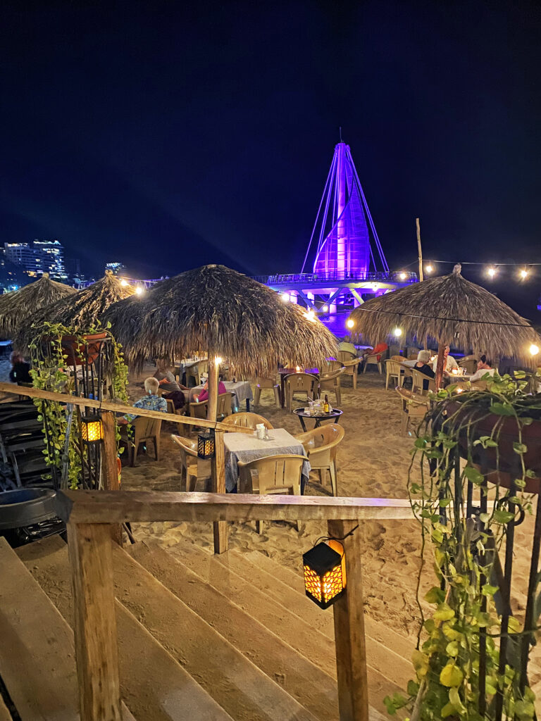 Malacon and Puerto Vallarta pier at night