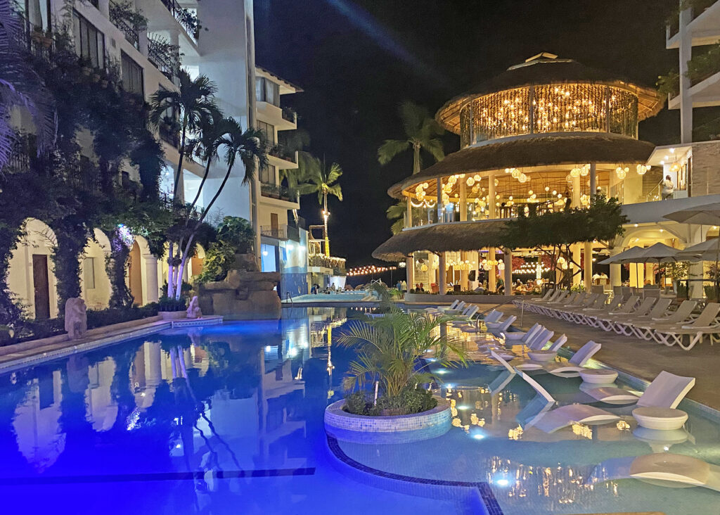 Playa Los Arcos Resort pool at night